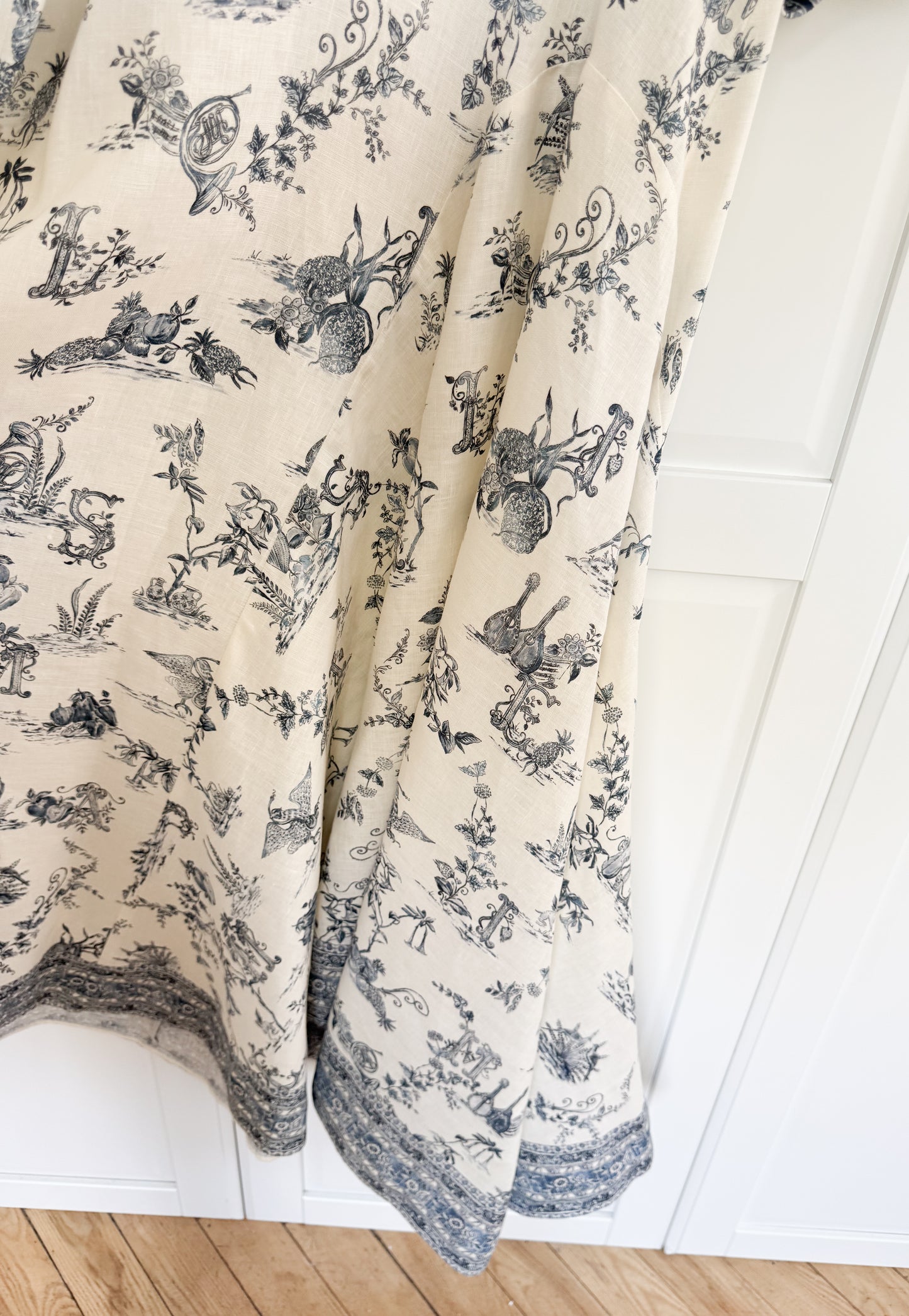 ALÉMAIS 'Casa' floral linen midi dress with puffy sleeves