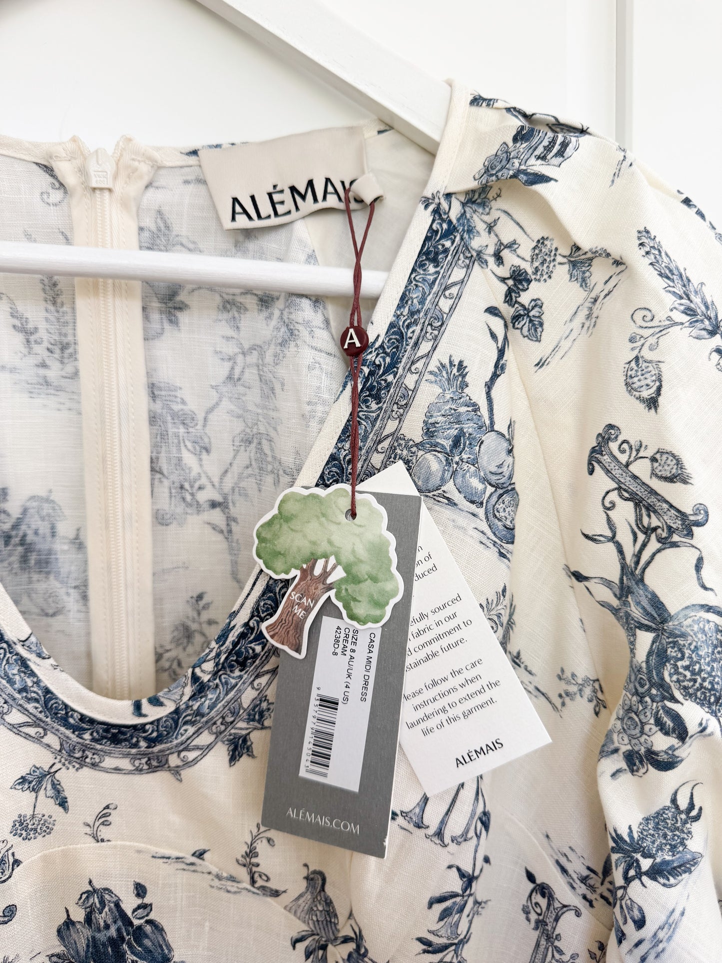 ALÉMAIS 'Casa' floral linen midi dress with puffy sleeves