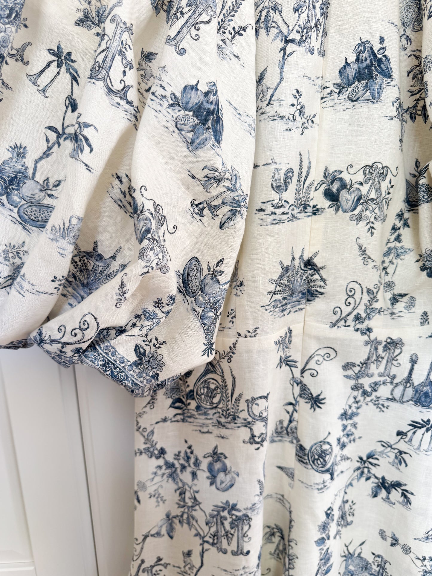 ALÉMAIS 'Casa' floral linen midi dress with puffy sleeves
