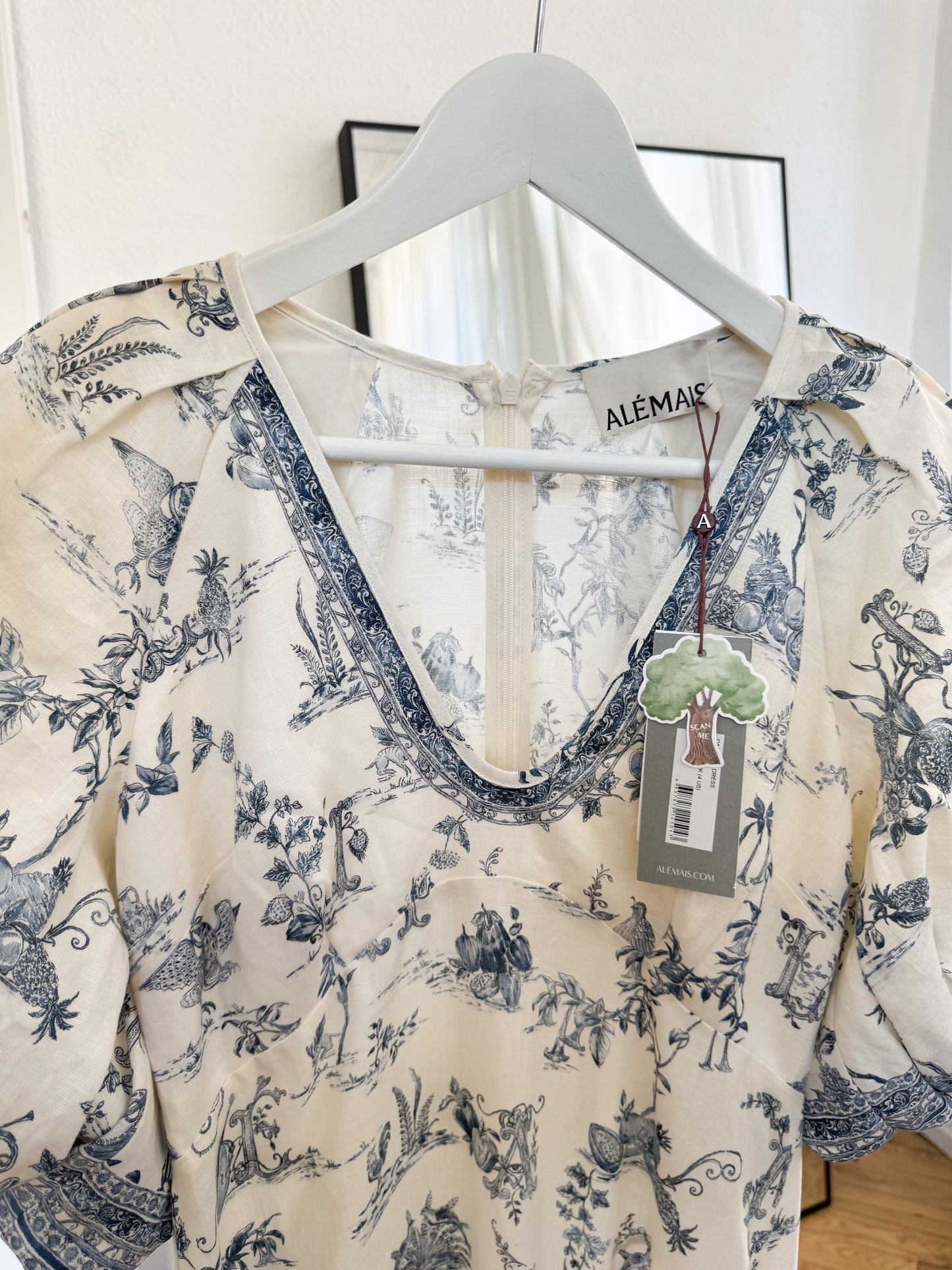 ALÉMAIS 'Casa' floral linen midi dress with puffy sleeves
