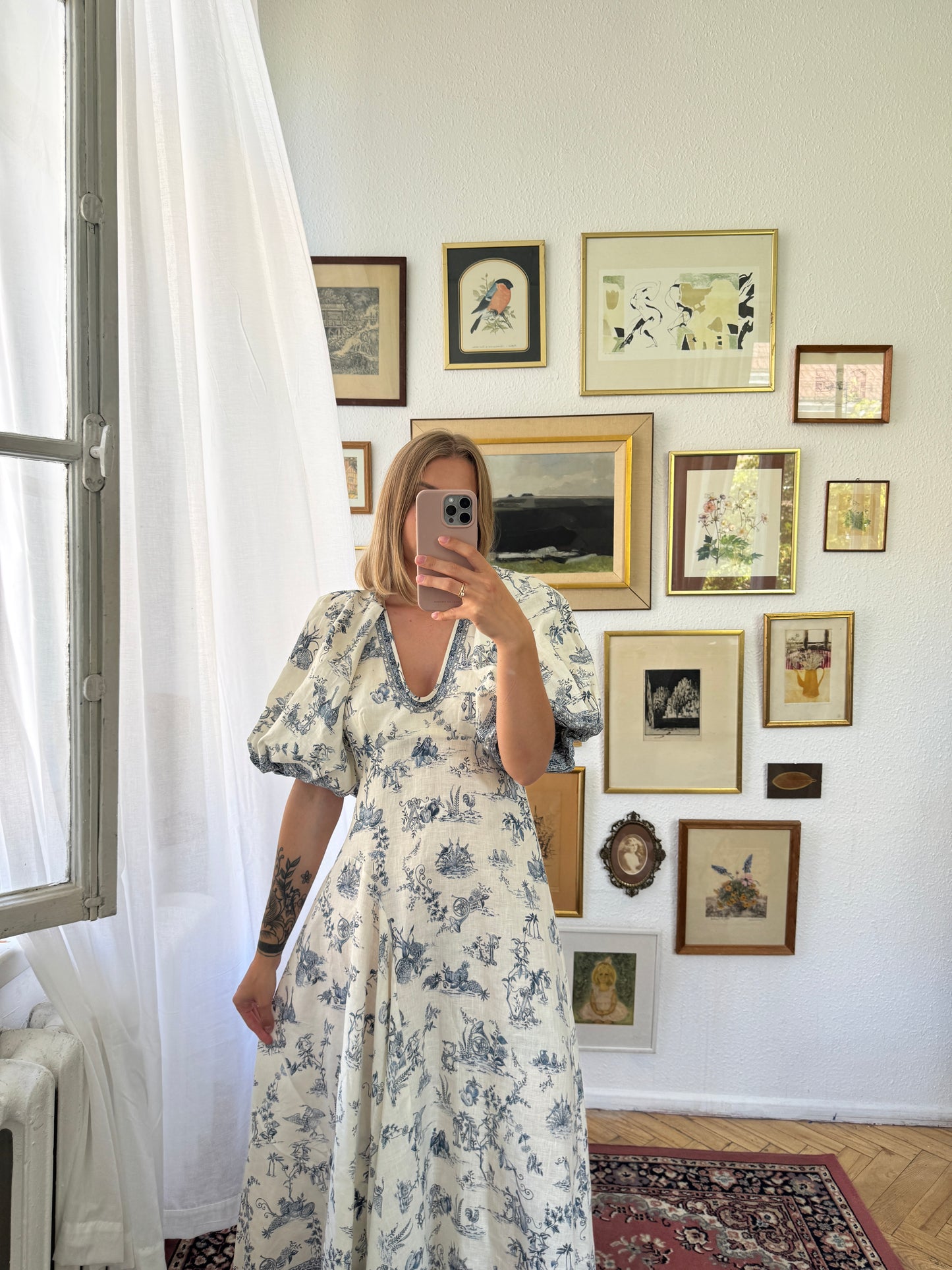ALÉMAIS 'Casa' floral linen midi dress with puffy sleeves